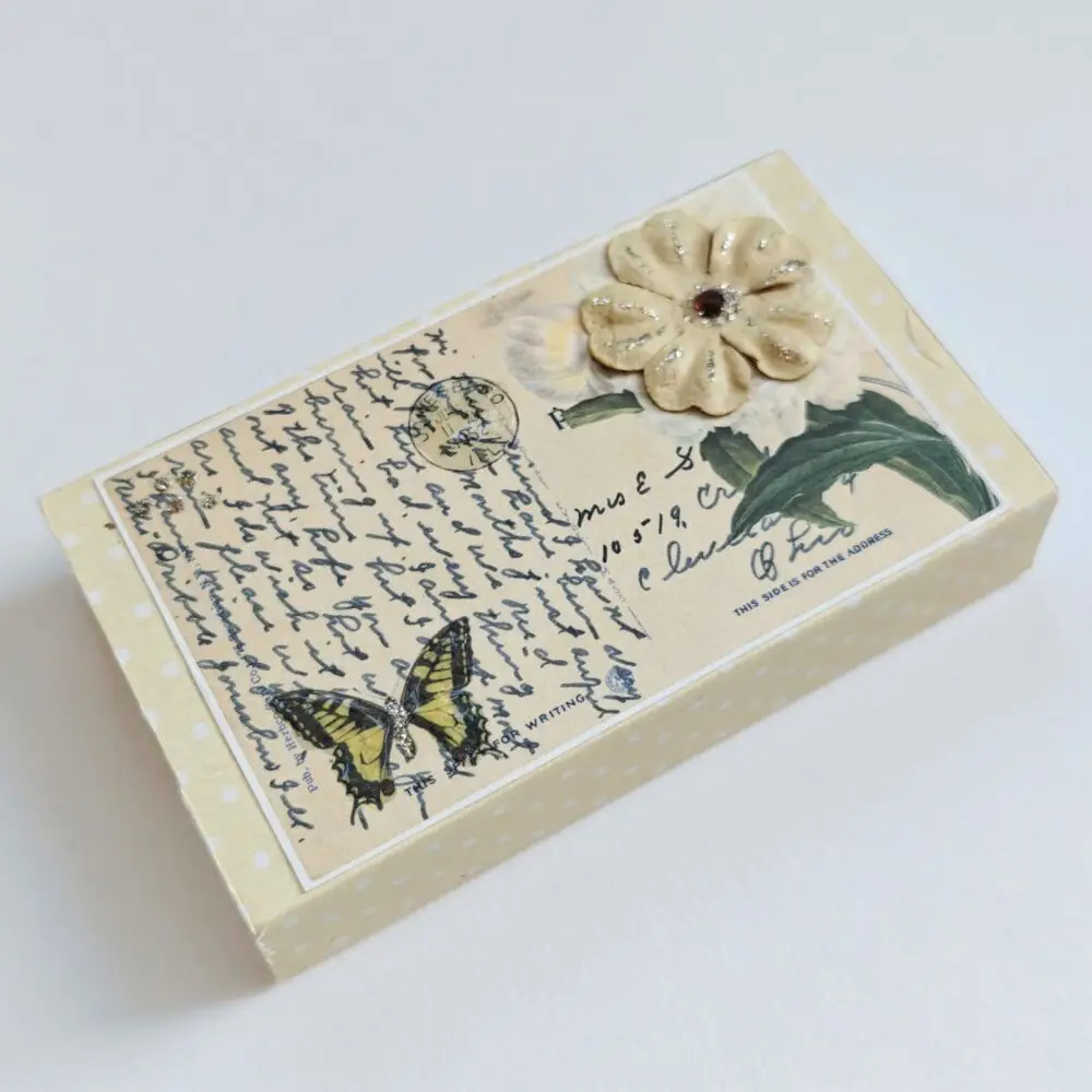 tändsticksask beige blomma